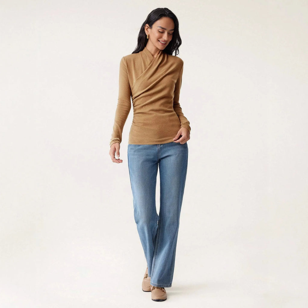 Camel-coloured slim fit women's long sleeve pullover sweater on a hanger.