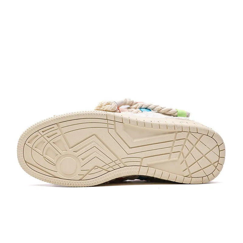 Cream white retro lace-up skateboard shoes with platform sole on a plain background