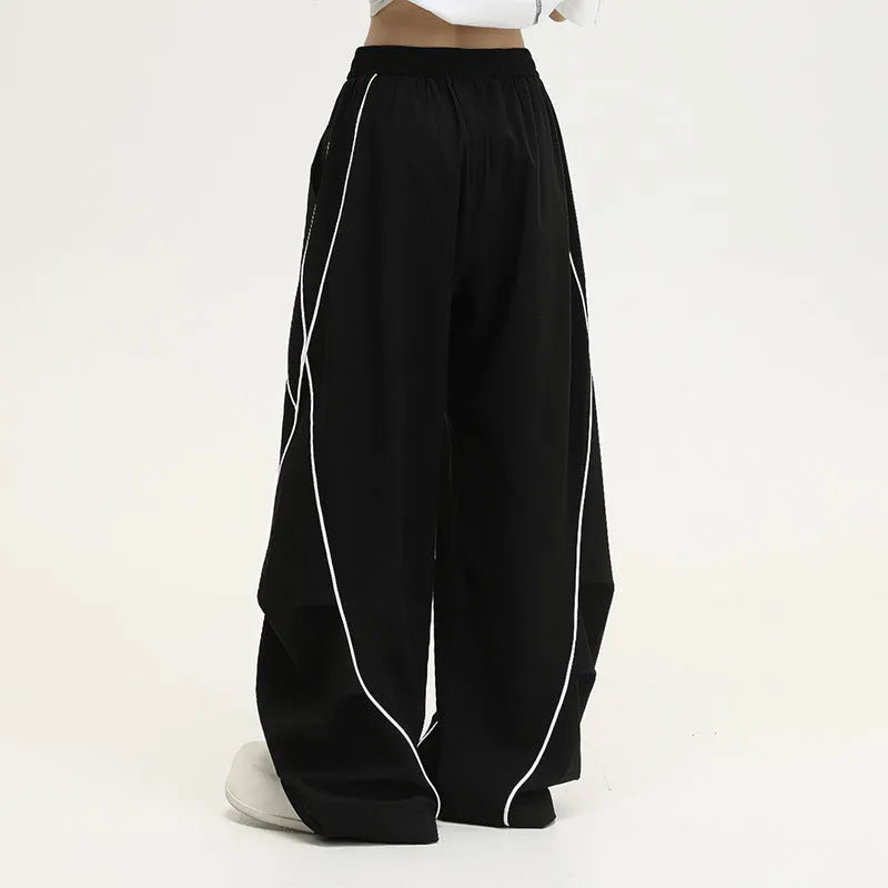 Black pleated wide-leg hip hop trousers with striped pattern and loose fit
