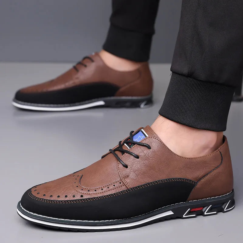 Men's black leather toe cap casual shoes with a rubber sole and sewing line detail on the fabric upper.