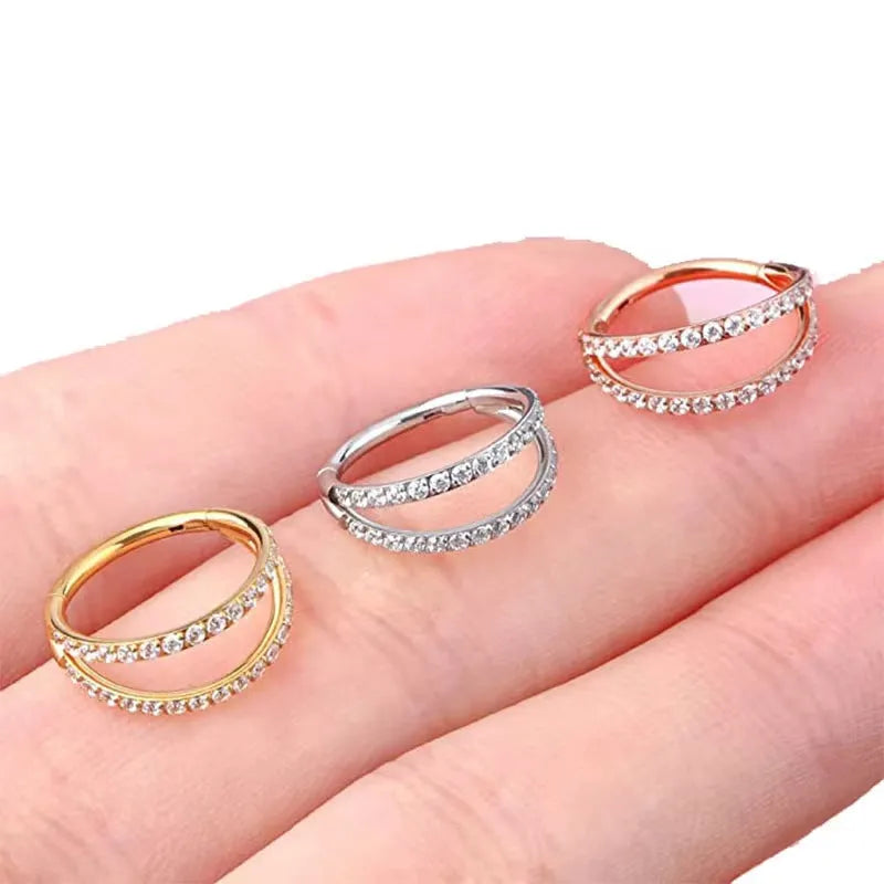 G23 titanium alloy lip and nose ring in gold or steel colour with diamond treatment, showing gauge and length sizes.