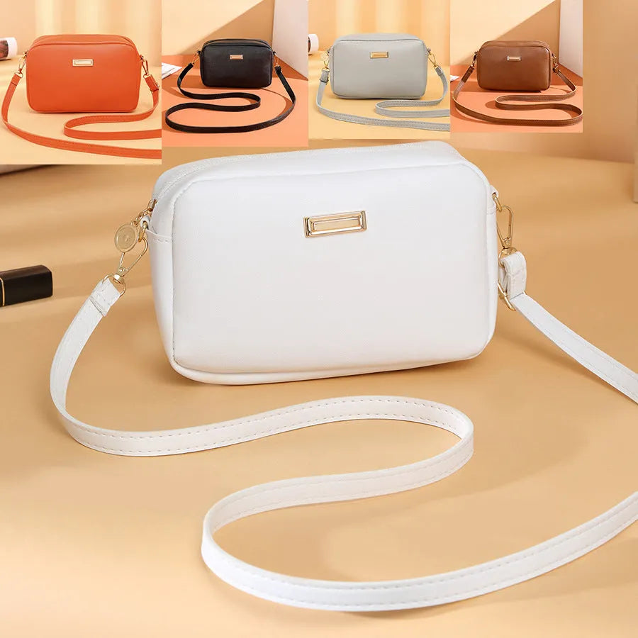 Women's solid colour PU shoulder bag with three-dimensional pocket in horizontal square design