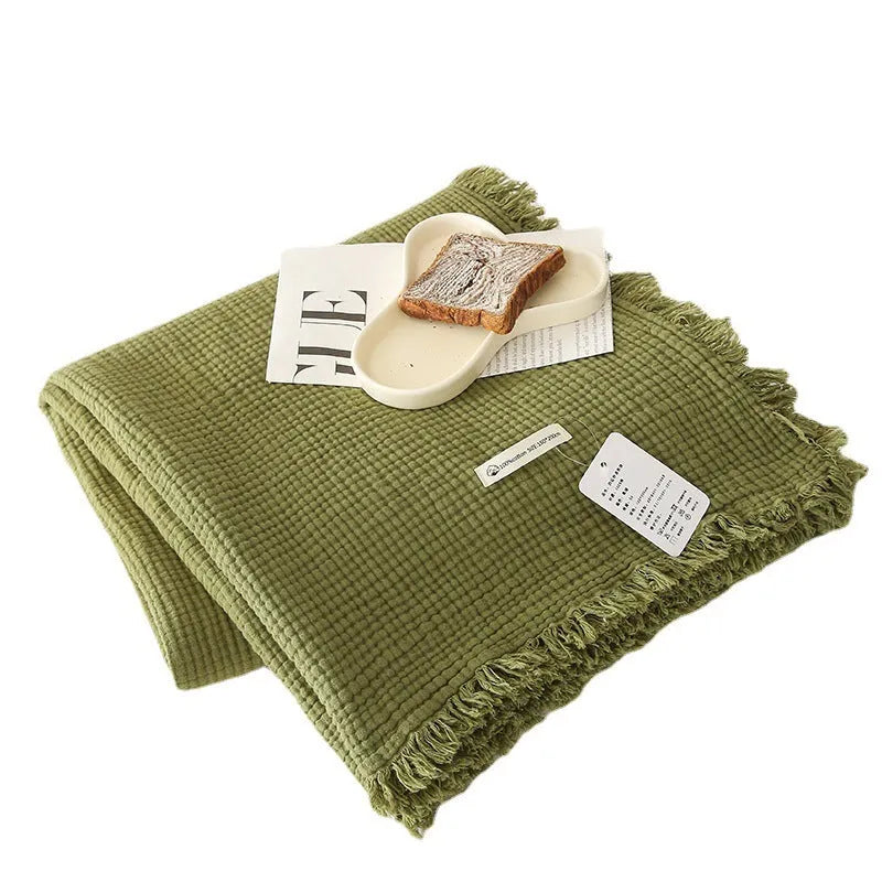 Four-layer gauze cotton blanket with tassel trim in various colours