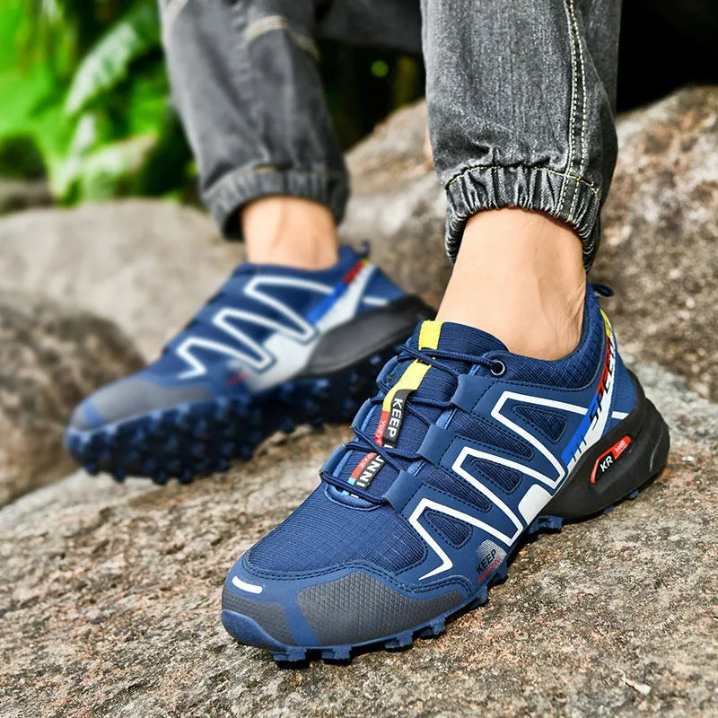 Men's gray orange plus size casual shoes with low-top design and rubber sole.