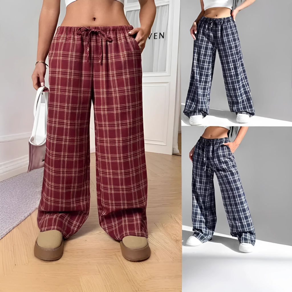 Women's red plaid casual trousers with drawstring waist and patch pockets laid flat