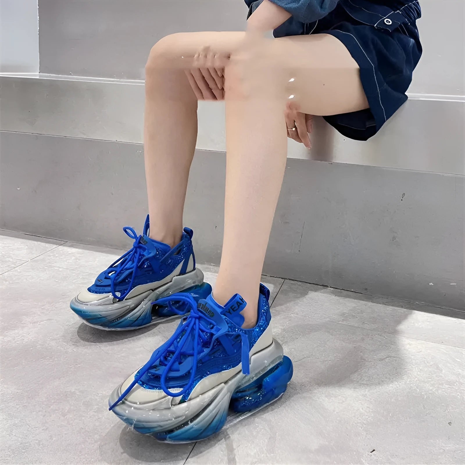 Women's leather sports shoes with thick jelly soles in multiple colours showing cross-tie design