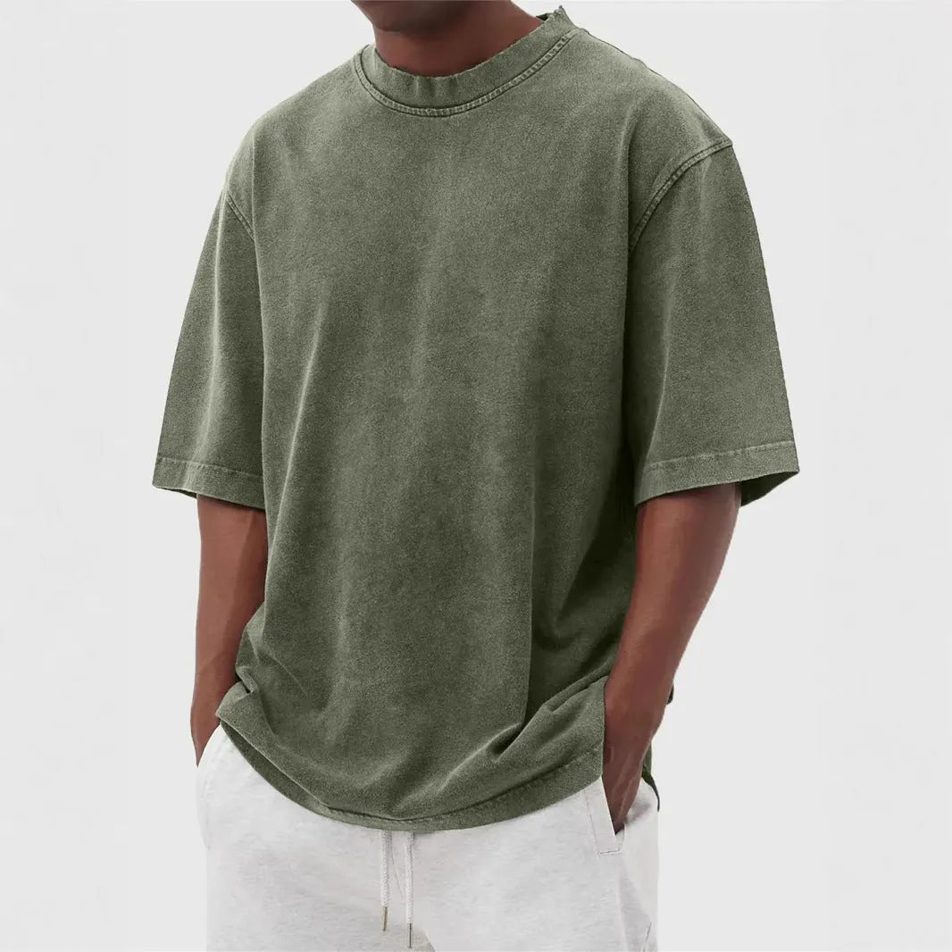 Men's stone washed distressed t-shirt in loose fit with half sleeves available in multiple colours