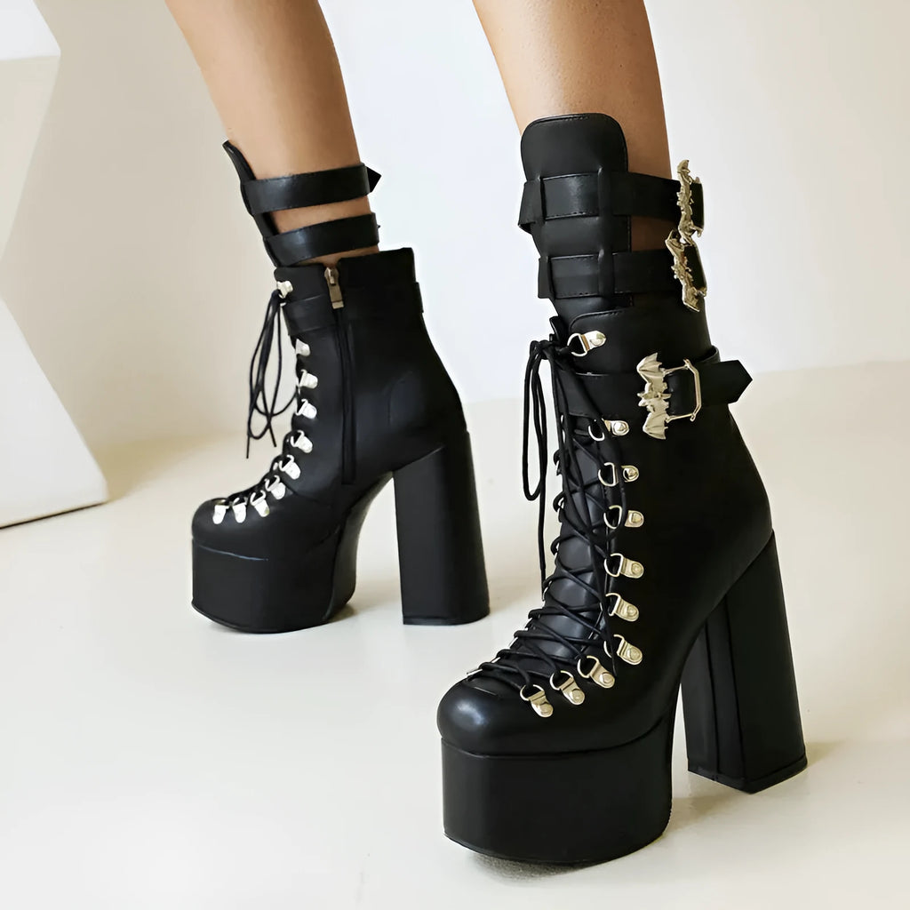 Chunky high-heel platform thigh-high boots in black patent leather with front lacing and block heel