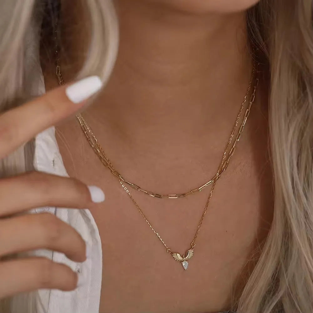 Women's silver eagle pendant necklace with adjustable O-ring chain in white gold or yellow gold colour