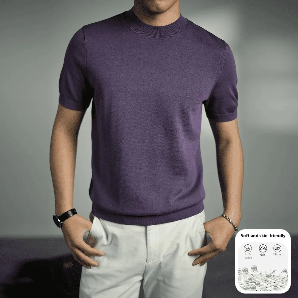 Man wearing a solid colour knitted t-shirt with round neck and short sleeves, showcasing business casual style.