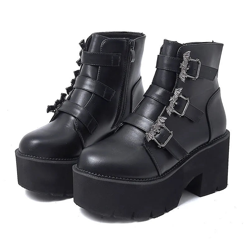 Black women's punk ankle boots with bat buckle and side zip, thick platform heel