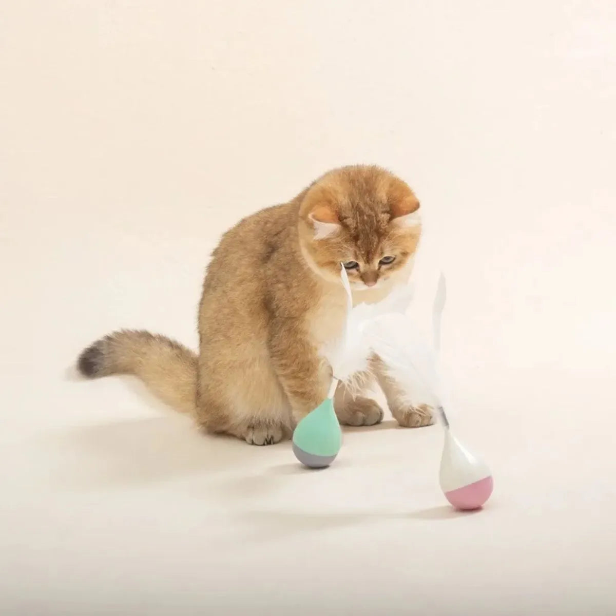 Feather tumbler cat toy with ABS stick and goose feather attachment in green colour