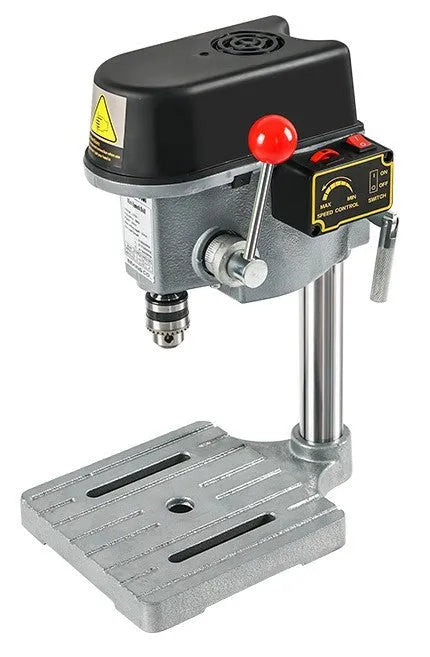 Mini bench drill and milling machine on a workbench with cross bench pliers and heavy duty pliers