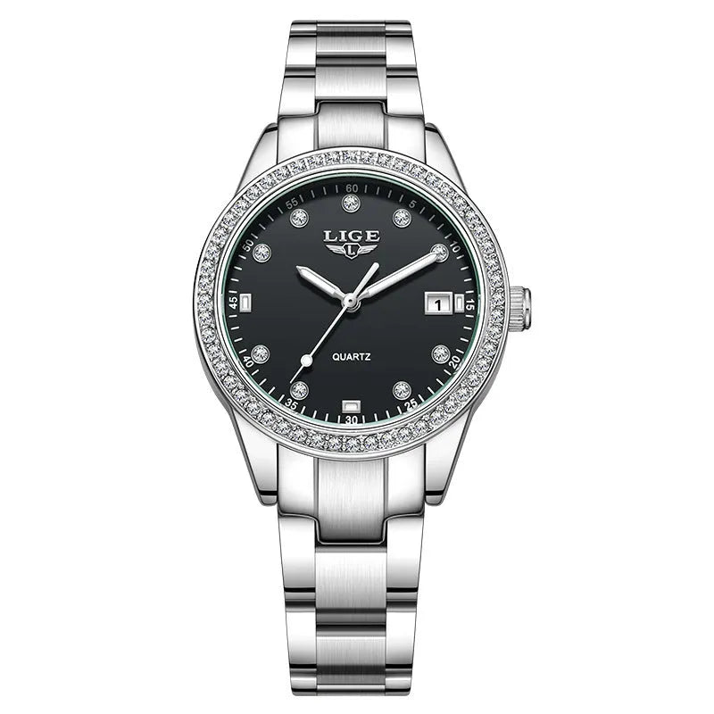 Women's silver quartz watch with diamond hour markers and luminous hands on 34mm round dial