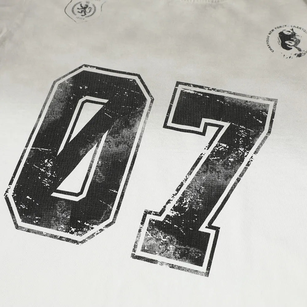 A man's short-sleeved printed t-shirt in pure cotton, shown in black and white colour options.