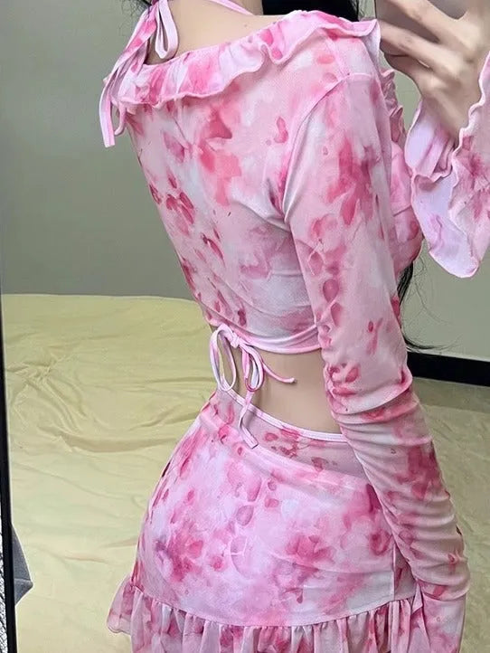 Women's floral bikini swimsuit in cherry blossom pink with matching floral print on both pieces