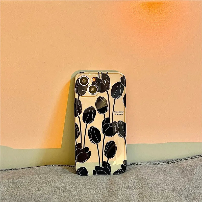 Black tulip patterned silicone phone case for Apple iPhone models on white background