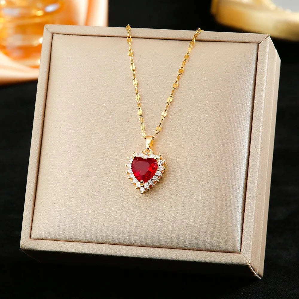 Gold red heart flower pendant necklace with matching earrings and ring set, made from titanium steel.