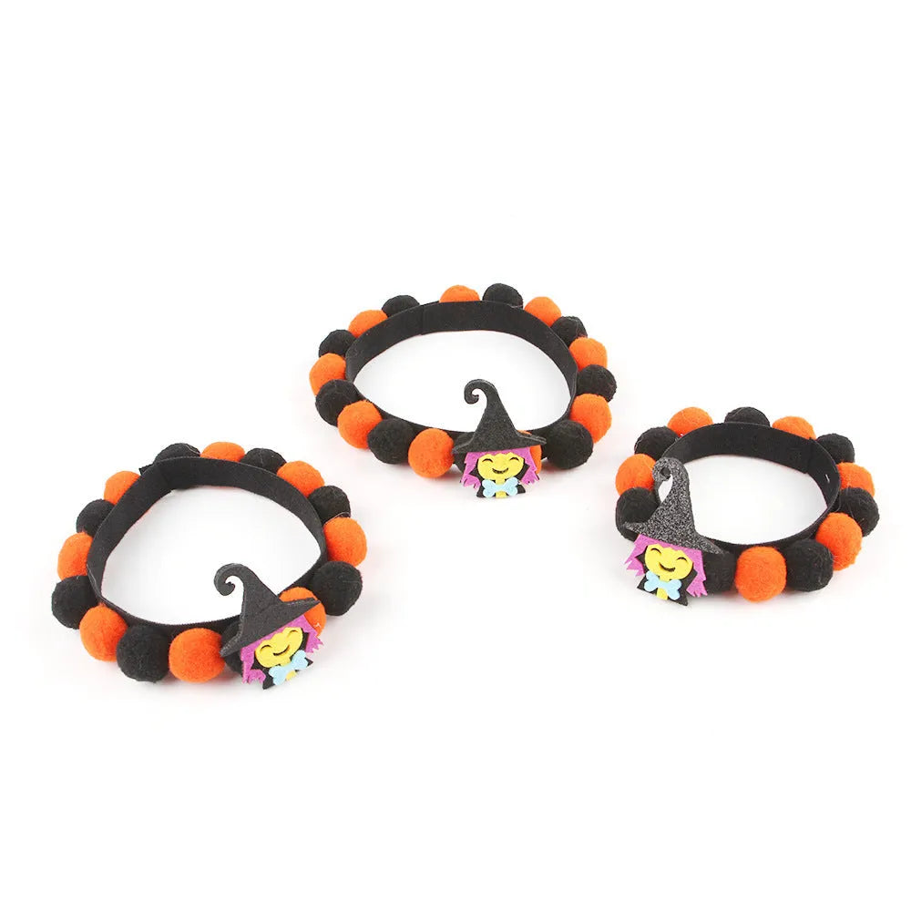 Halloween pet collar with decorative fur ball in pumpkin, skull, or witch style