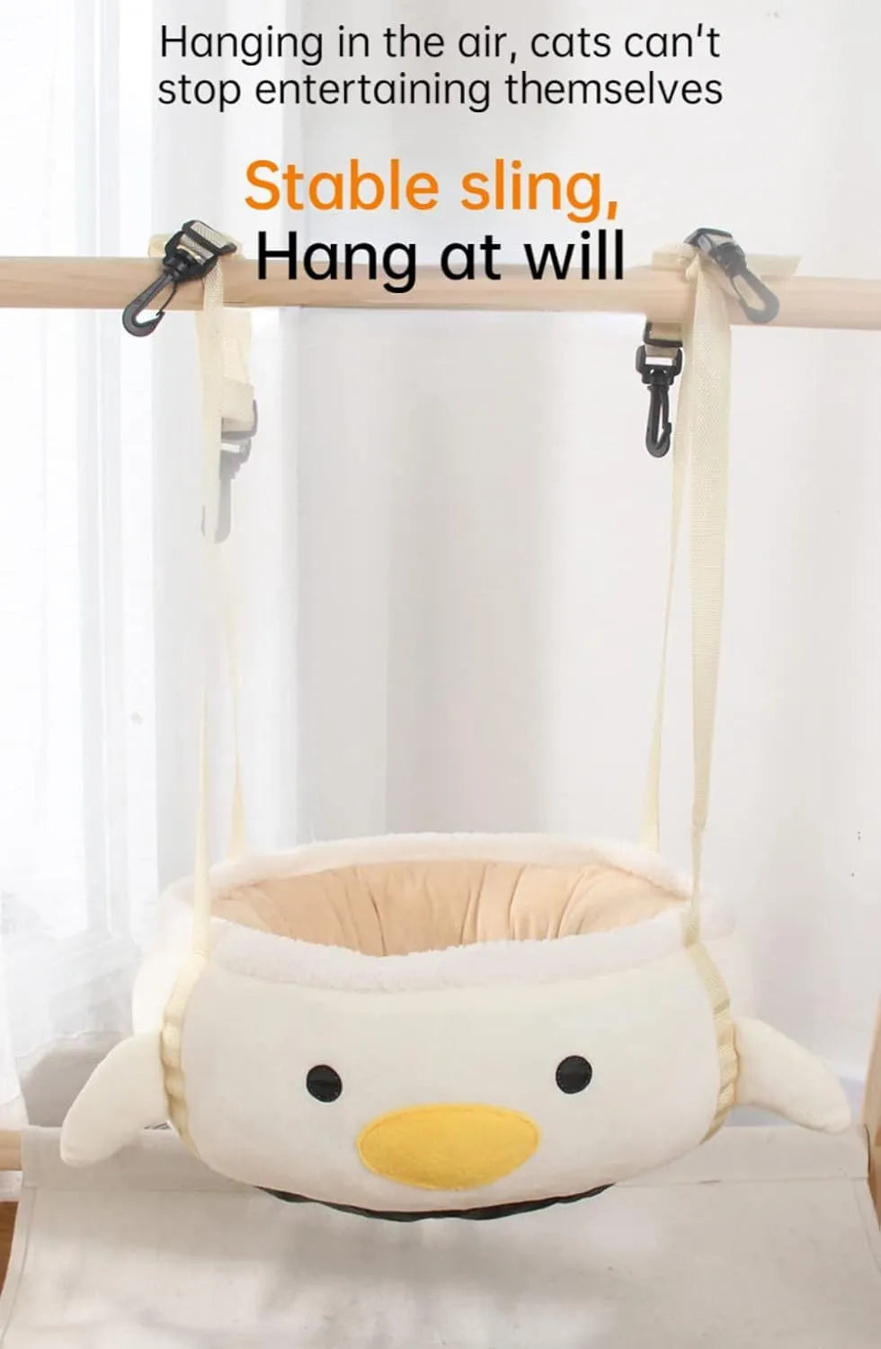 Green chick and dinosaur shaped cat bed shown both flat as a nest and hanging as a hammock for small pets.