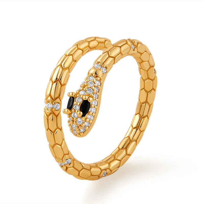 Snake-shaped adjustable copper ring with 18K gold colour retention plating on index finger