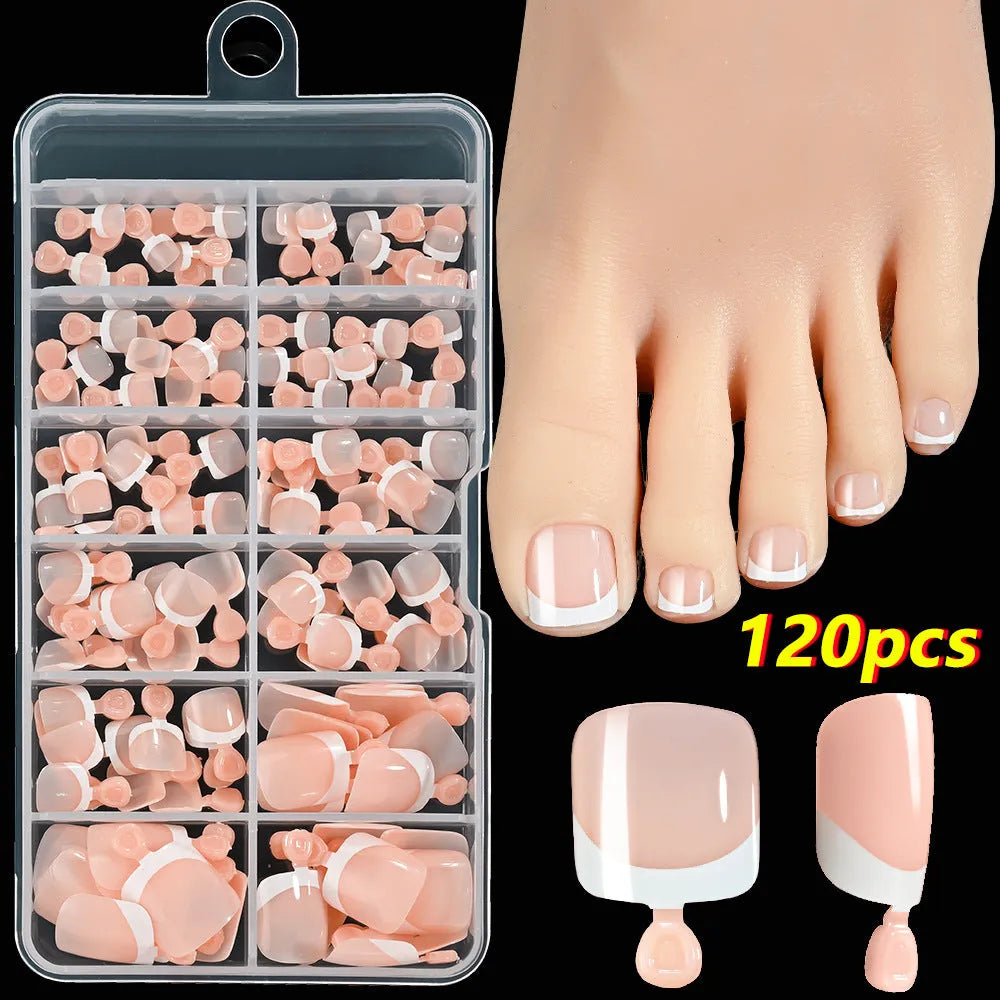 120 piece box of French white edge nude artificial toenails in nine shades, square short shape for toes.