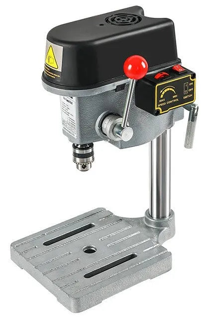 Mini bench drill and milling machine on a workbench with cross bench pliers and heavy duty pliers
