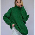 Women's high neck loose fit sweater in imitation cashmere polyester fabric.