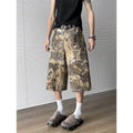 Yellow women's jeans with snake camouflage pattern, cropped length, cotton denim fabric