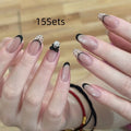 Set of sweet girl themed press-on false nails in assorted random colours and designs.