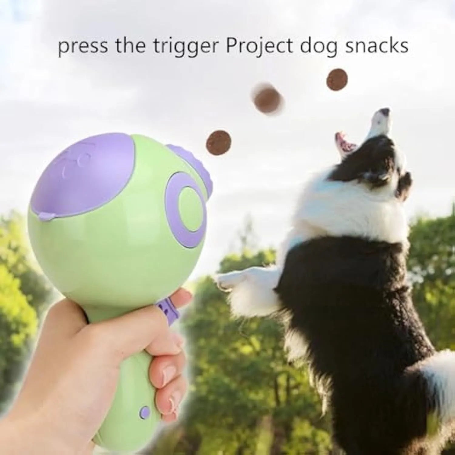 Green, orange or pink plastic dog treat launcher toy measuring 15.5cm with food dispensing and training functions
