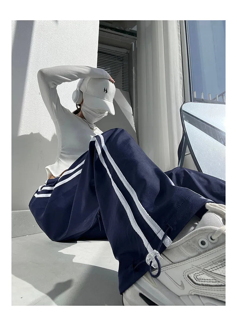 Ribbon parallel bars contrast colour loose straight trousers in white and navy blue colours