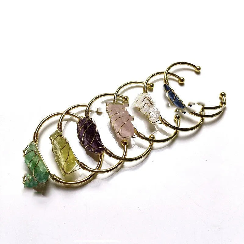 Geometric natural crystal bracelet with gold winding and ethnic bohemian design