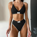 Women's bikini set with contrast binding and letter embroidery details, sleeveless design with shorts-length bottoms