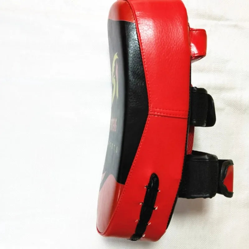 Square black and red hand-held boxing Sanda training pad with sponge and buckle.