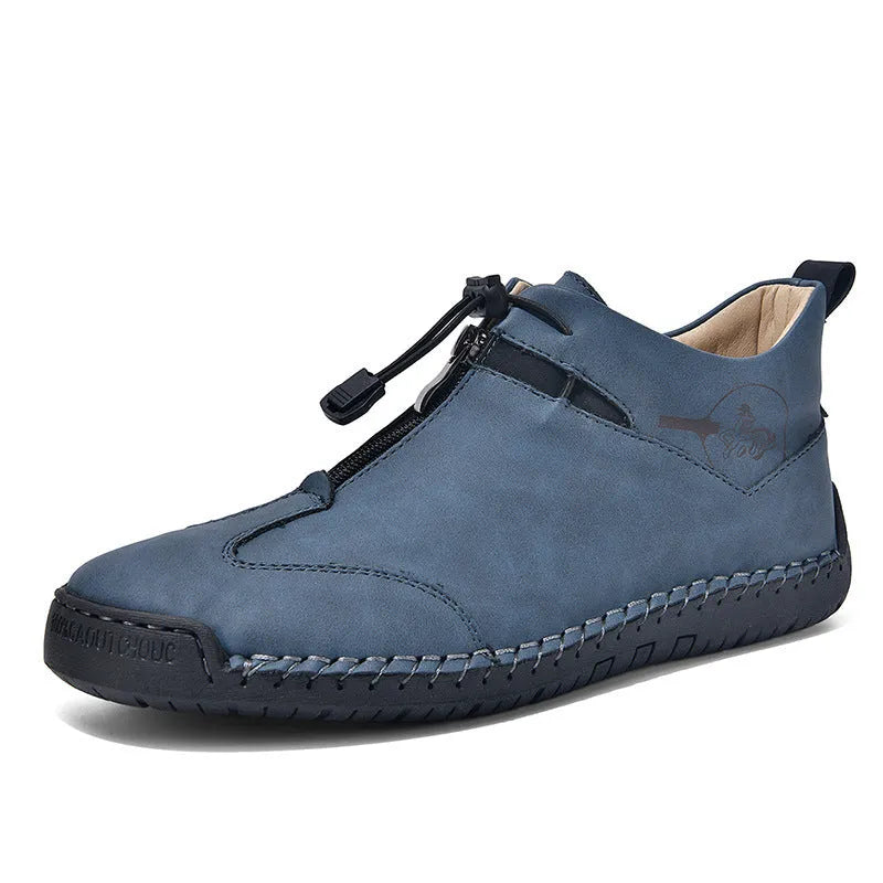 Casual men's leather shoe in green with round toe, mid heel, and decorative stitching