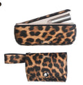 Leopard print polyester storage protective bag with zipper, shown next to cosmetics.
