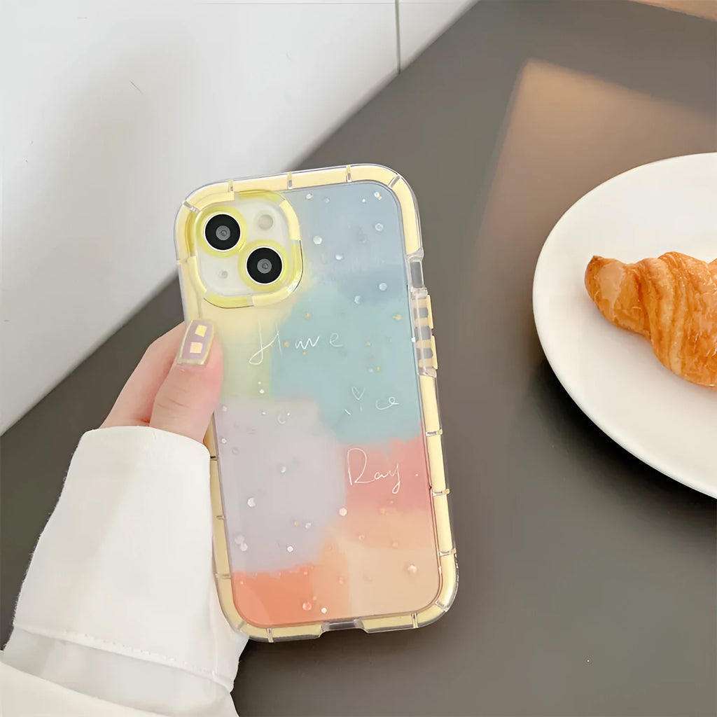 Minimalist contrast colour silicone iPhone case with yellow edge trim shown on iPhone