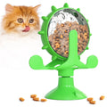 Blue interactive pet puzzle toy slow feeder with sucker base on a floor