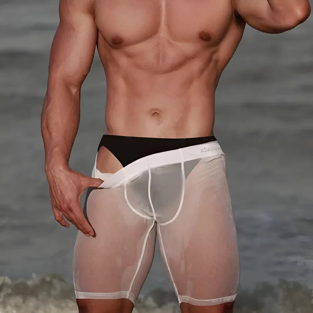 Men's solid colour mesh shorts with seamless knitted nylon fabric in black, white, or pink.