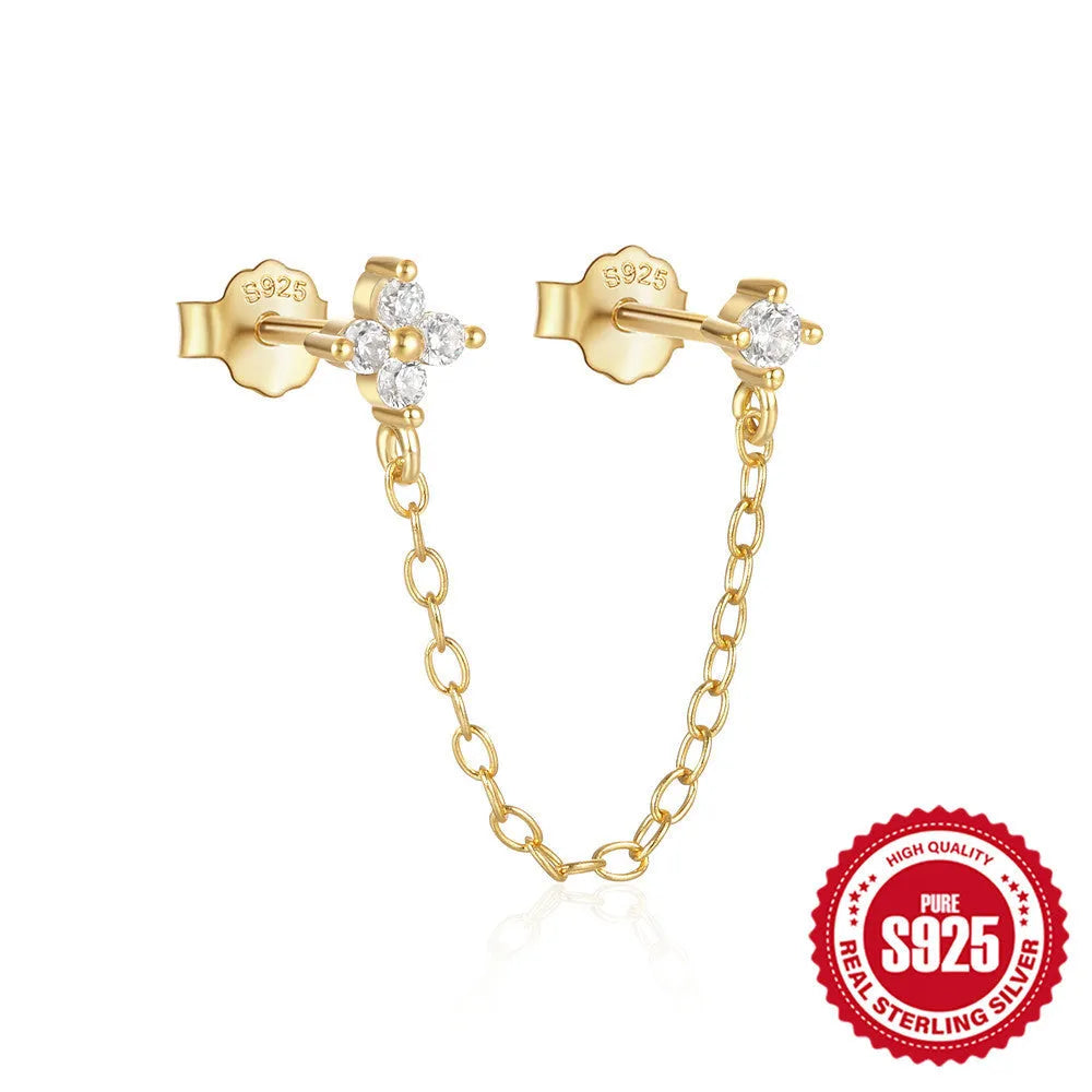 S925 sterling silver geometric ear clip stud earrings with chain, flower and tassel detail in gold electroplated finish.