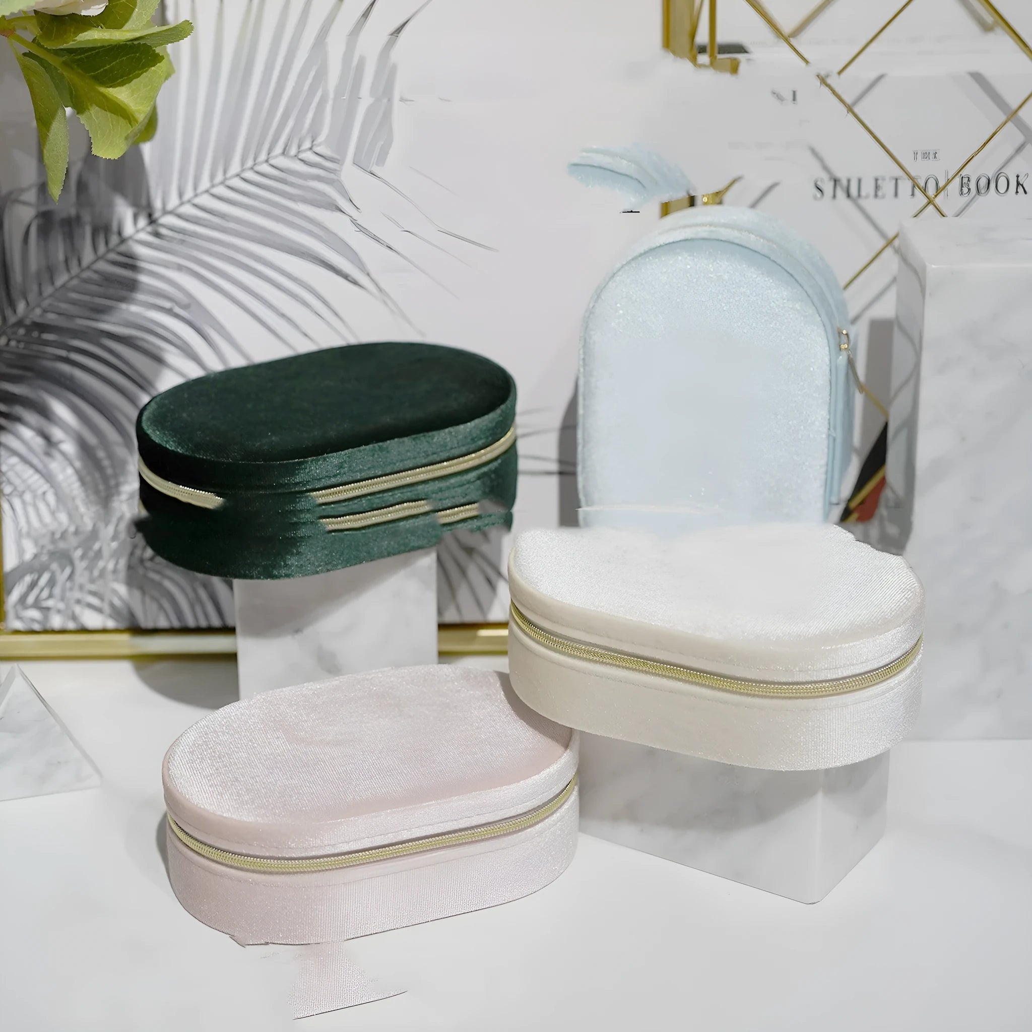 Oval velvet jewellery storage box in multiple colours with flannel interior, measuring 15x10x5cm