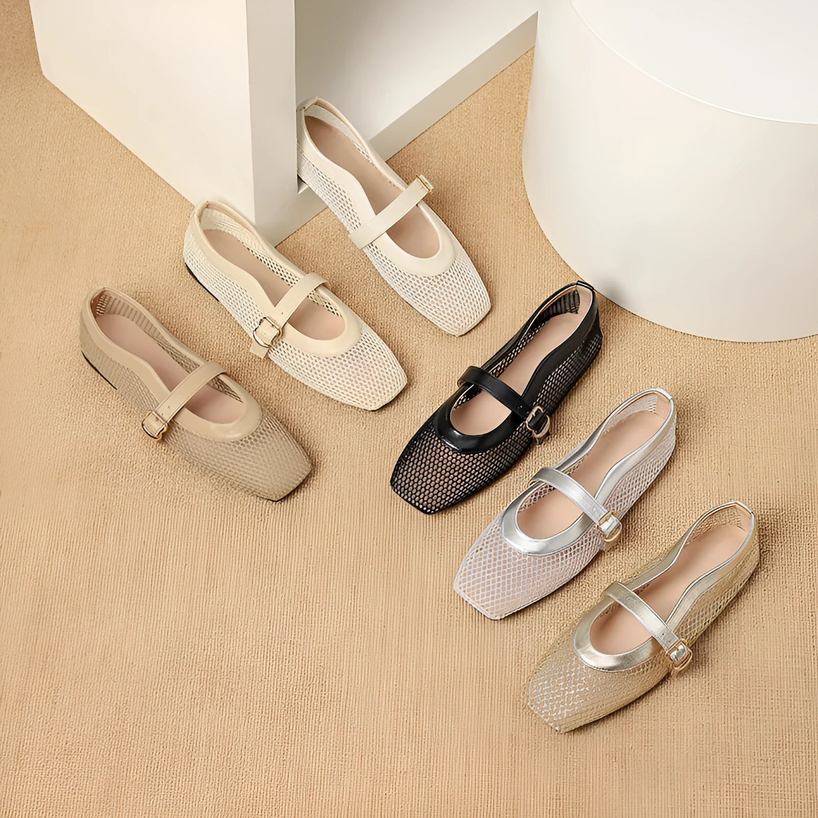 Women's low-heel summer pump in mesh with buckle fastening and square toe, shown in a neutral colour.