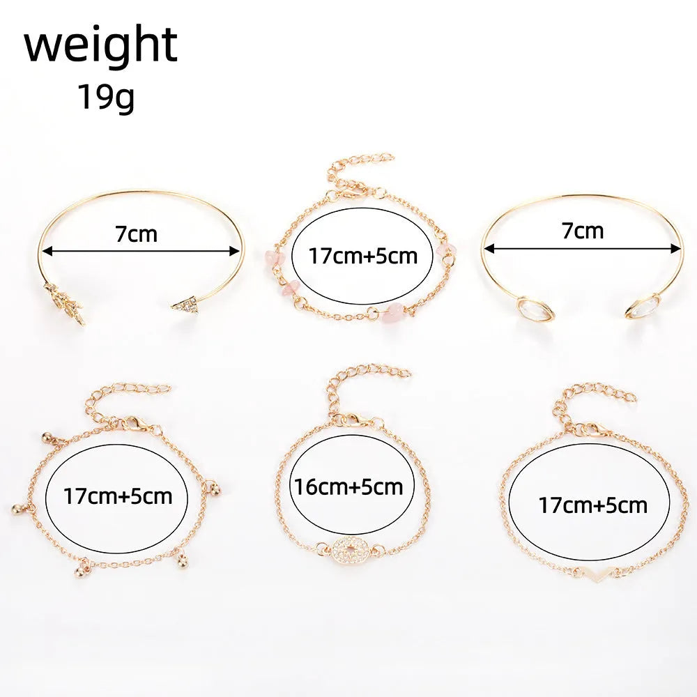 Gold six-piece bracelet charm set with V-shaped, arrow, water drop, and spot drill designs on zinc alloy