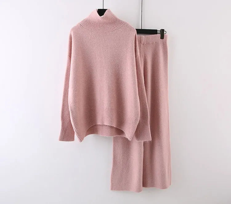 Women's beige casual sweater and wide-leg pants two-piece set on a hanger.