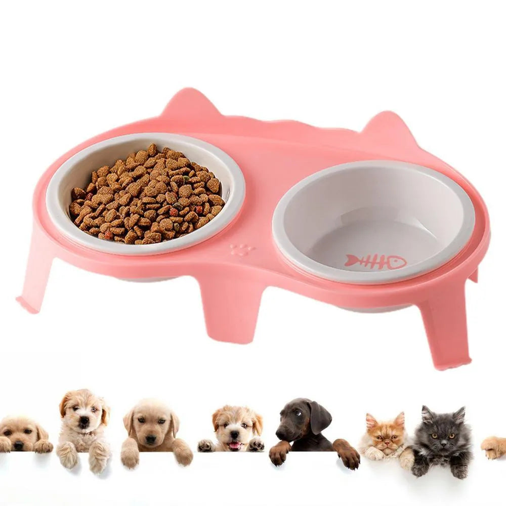 Blue ceramic cat food and water bowls sitting in a white elevated tilted stand with a hook