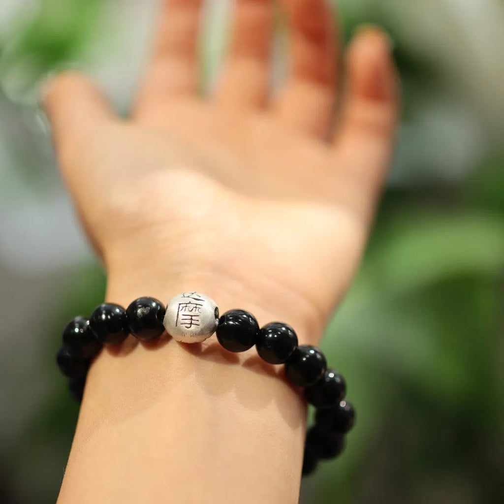 Women's black agate bracelet with 10mm beads and sterling silver in Chinese style design