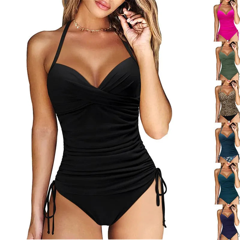 Women's black high waist backless nylon bikini set for swimming sports on a mannequin.
