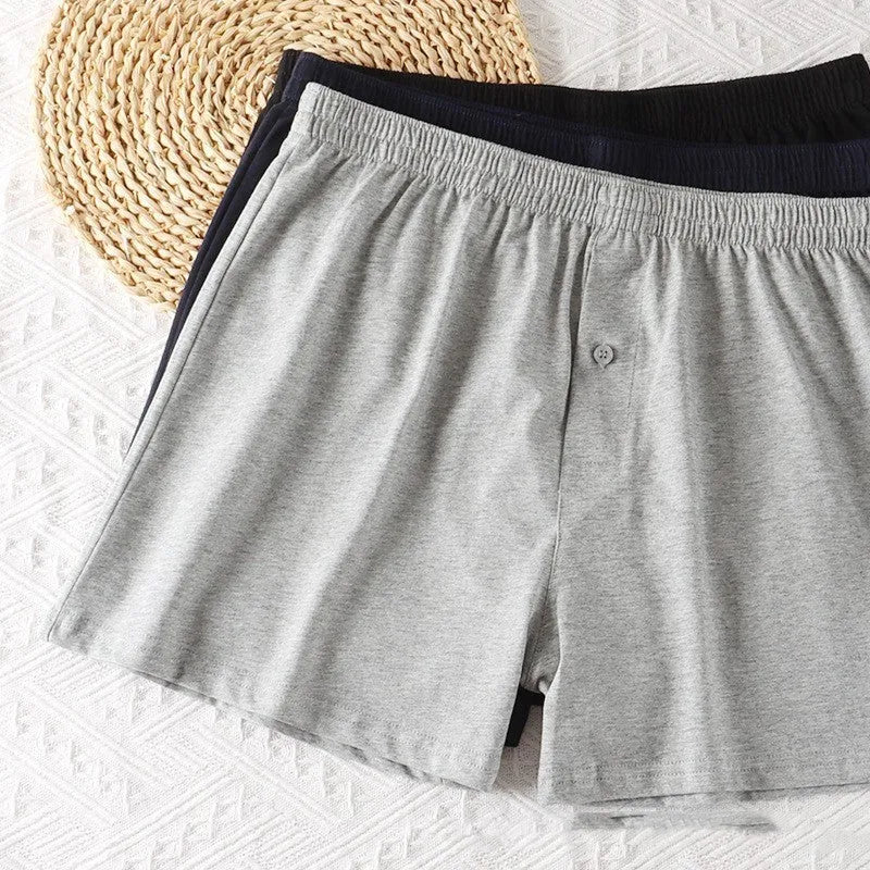 Men's pure cotton boxer shorts in light grey colour showing loose fit and high waist design