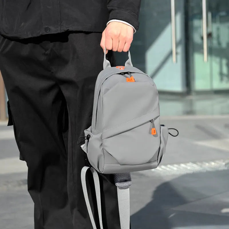 Men's casual crossbody bag in black or grey waterproof polyester with simple style design